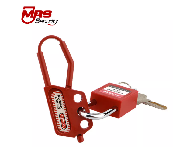 Safety padlock securely fastening a gate, symbolizing protection and security.